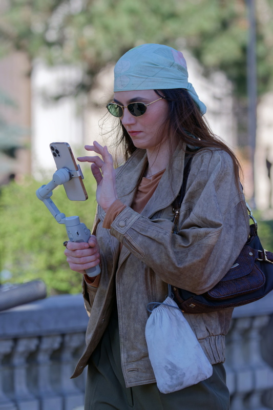 Woman fingering phone 1